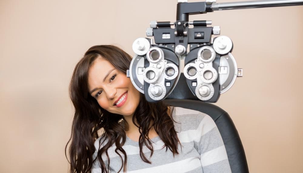 Optometrist conducting an eye exam.